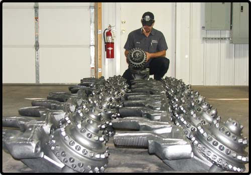 Kenny looking over some tricone cutters before being shipped out.