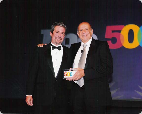 Tim is handed the INC 5000 Award